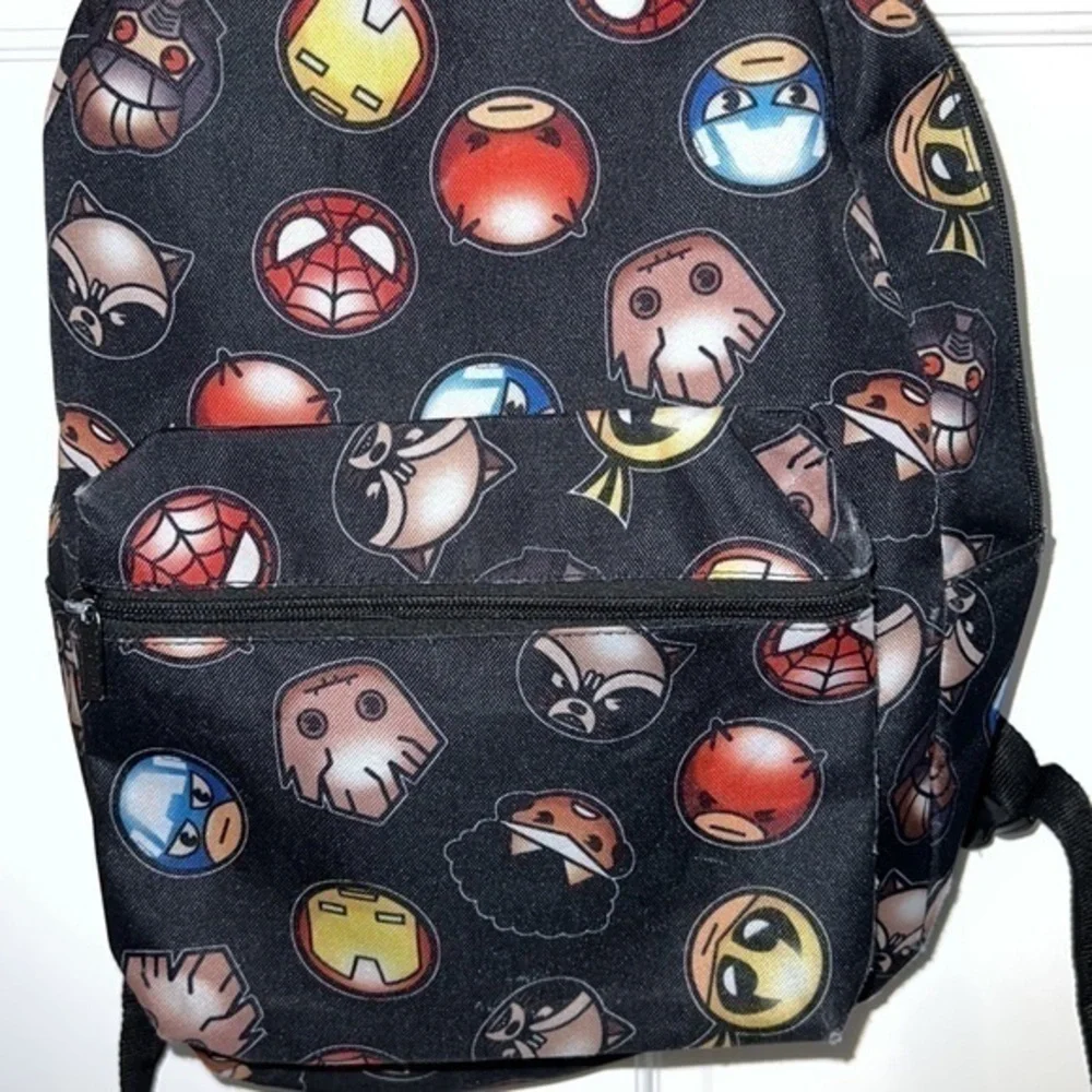 Marvel backpack. Some scuffs throughout but otherwise in good condition.